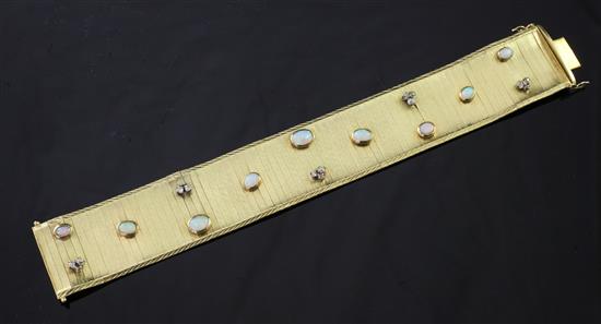 An 18ct gold, white opal and diamond cluster articulated bracelet, 7.25in.